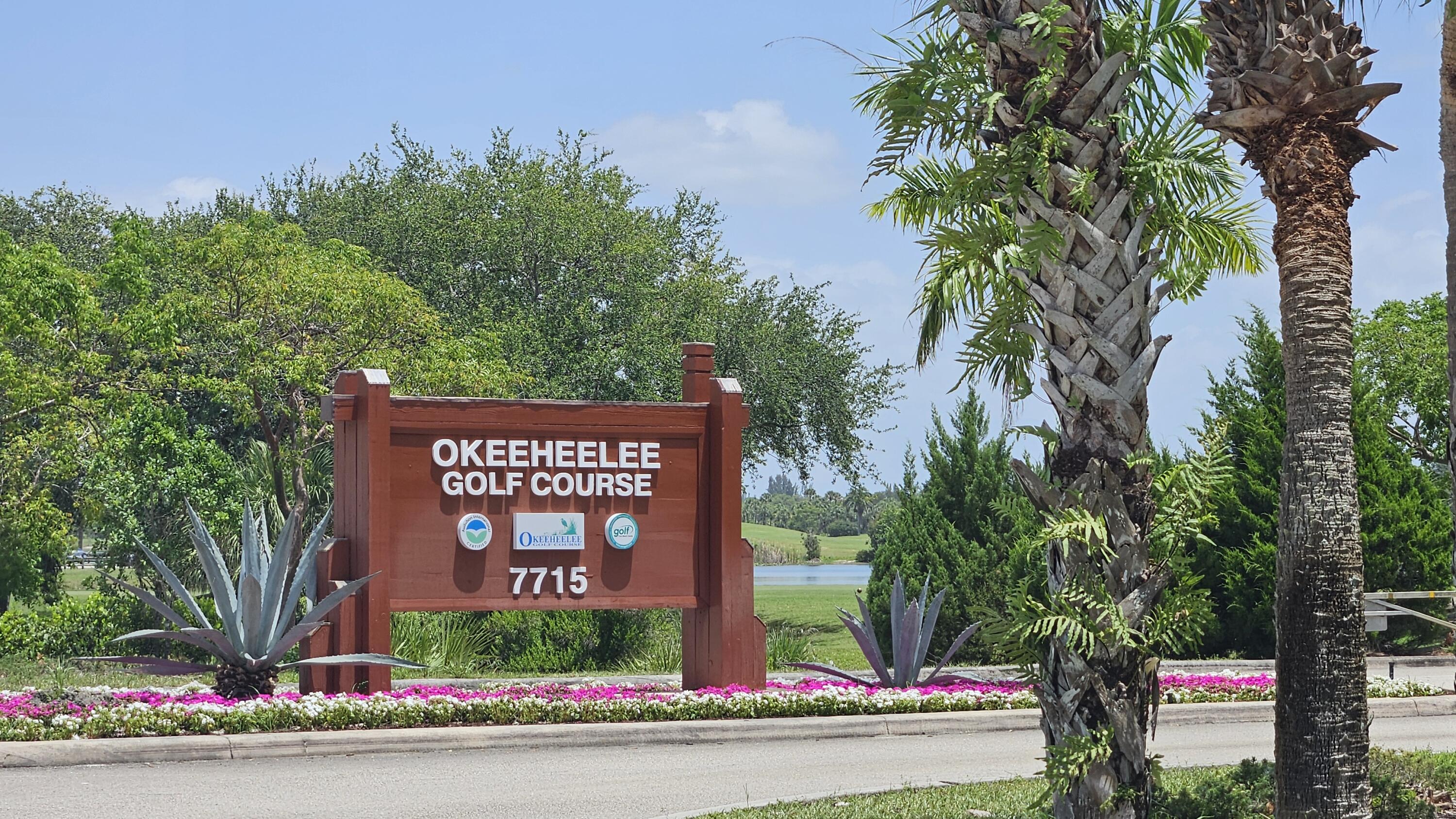 1768 Sawgrass Circle Greenacres, FL 33413 - Photo 40 of 40 a sign on the side of a road