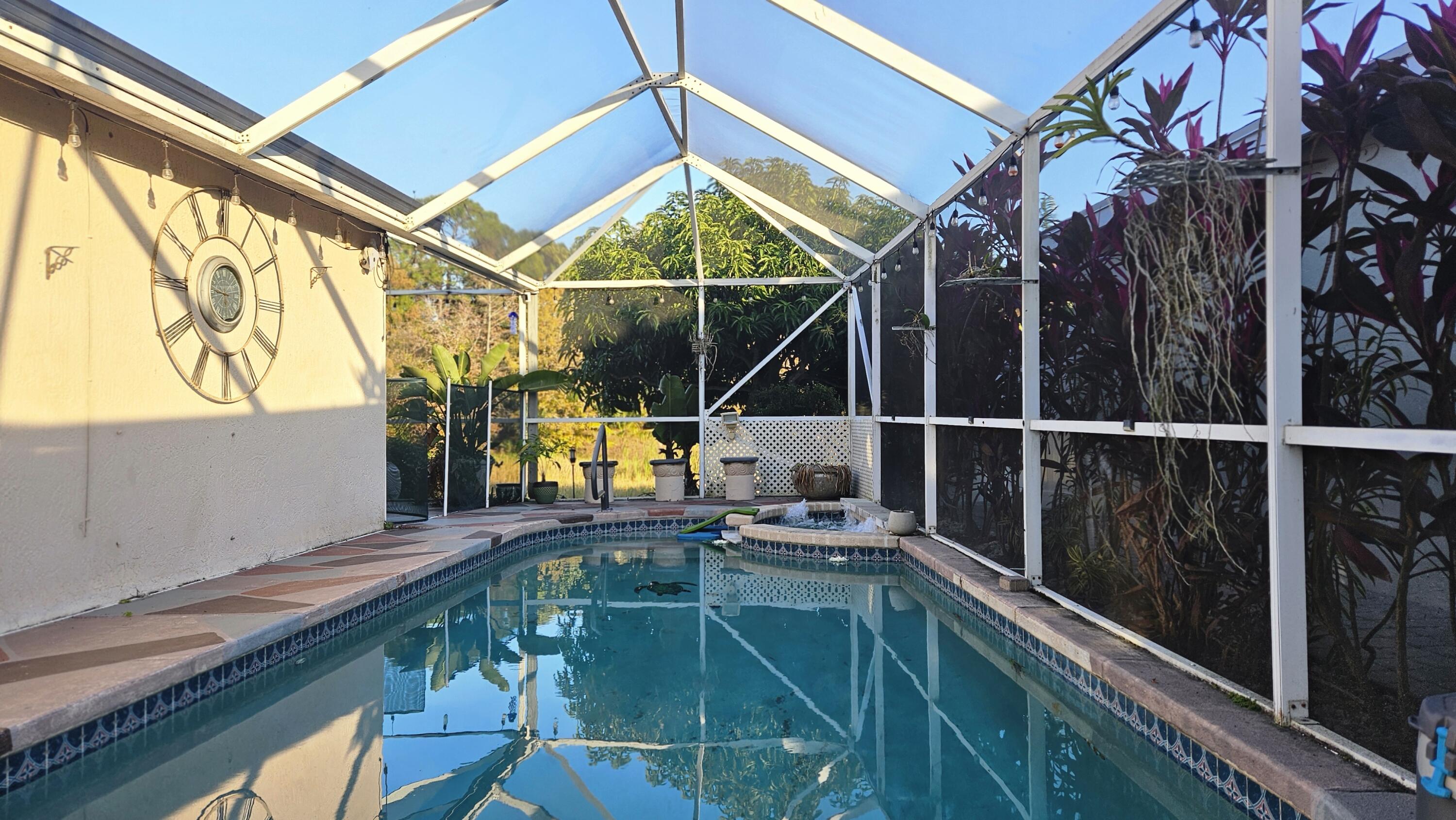 1768 Sawgrass Circle Greenacres, FL 33413 - Photo 6 of 40 a view of a ocean from a balcony