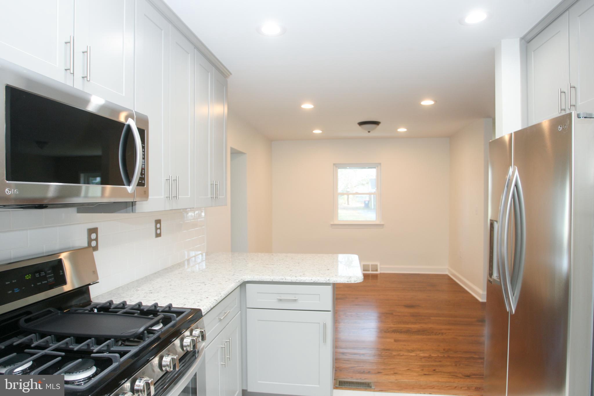 13 Windsor Road Wilmington, DE 19809 - Photo 14 of 37 Open to Dining with recessed lighting