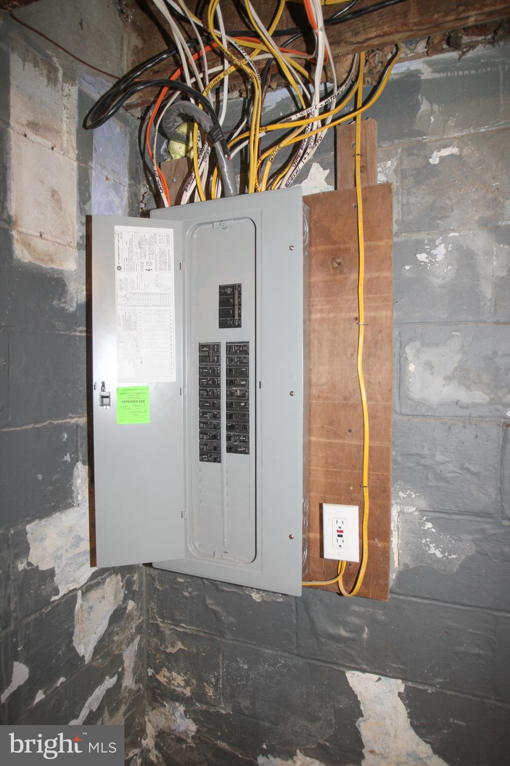 13 Windsor Road Wilmington, DE 19809 - Photo 33 of 37 New electric panel with inspection sticker