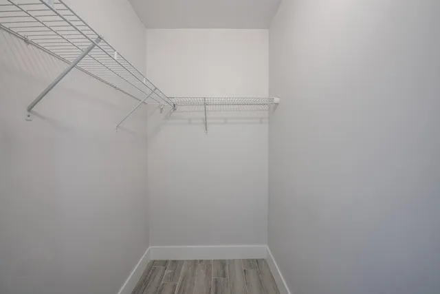 a view of a room with racks on the wall