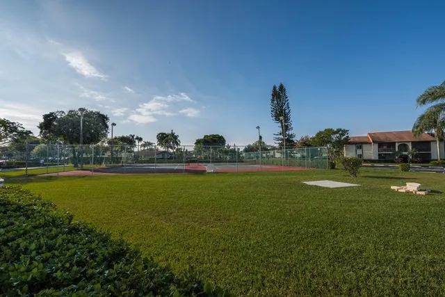a view of a house with a big yard
