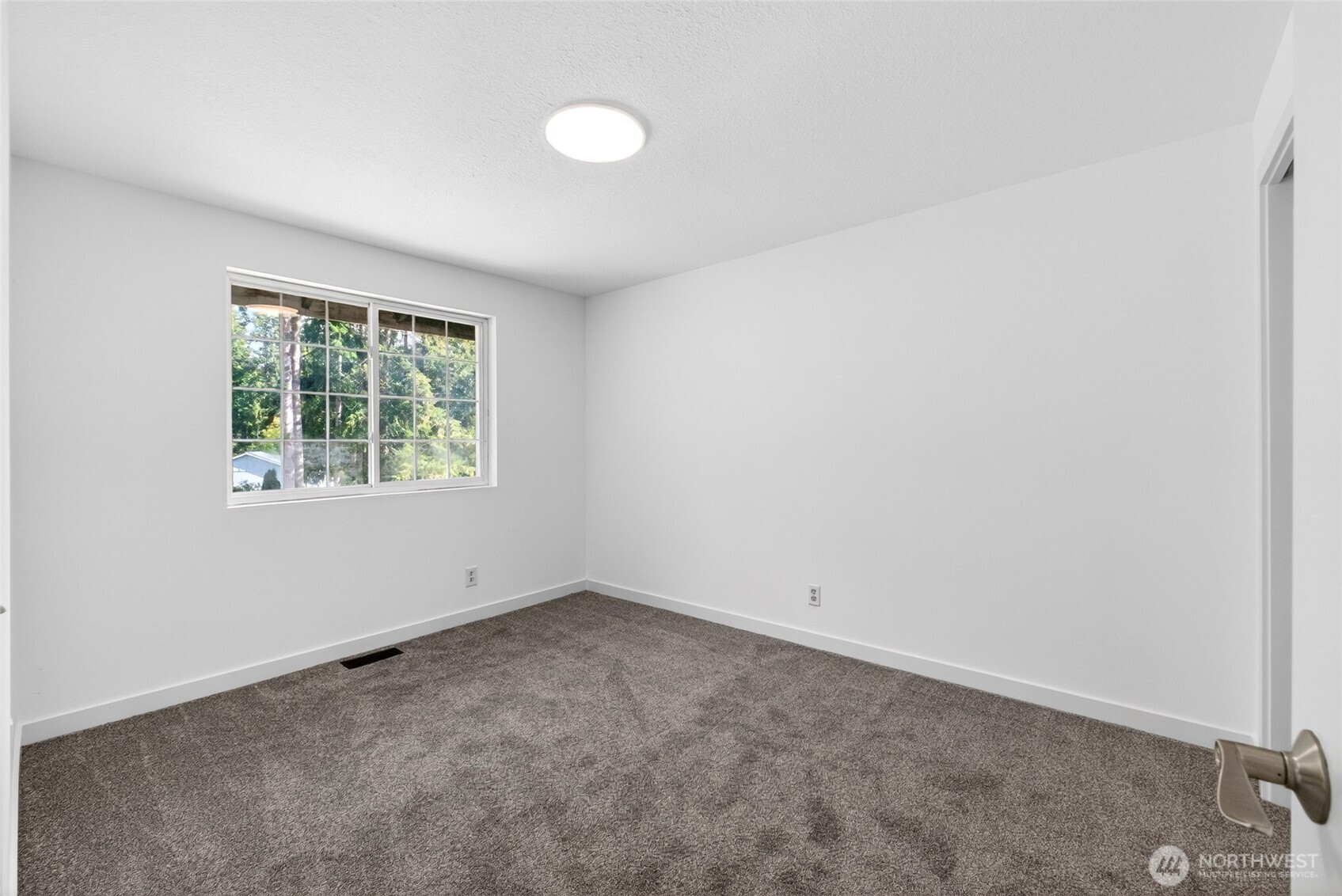 19010 63rd Street East Lake Tapps, WA 98391 - Photo 13 of 32 an empty room with windows