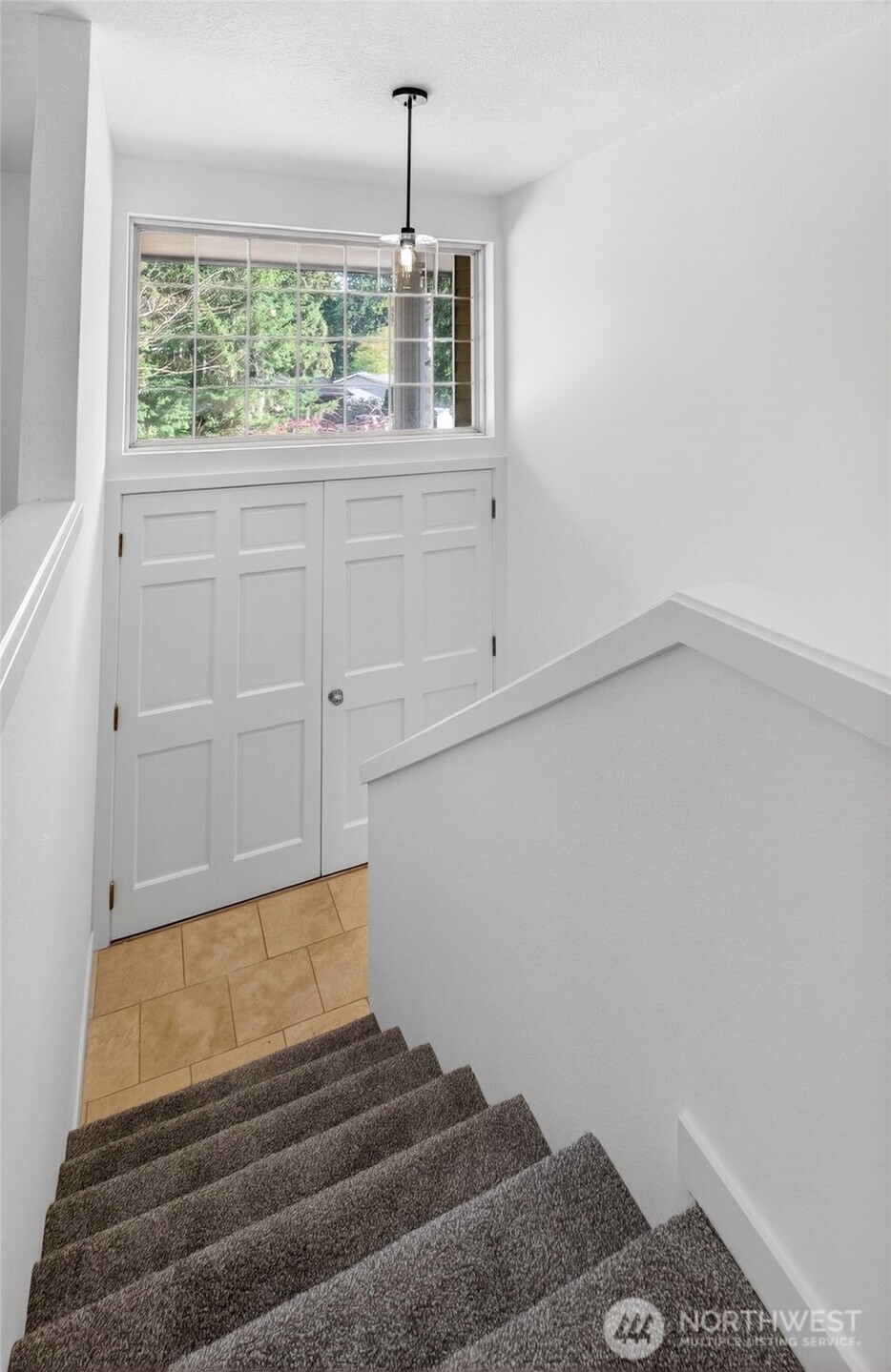 19010 63rd Street East Lake Tapps, WA 98391 - Photo 17 of 32 a bedroom with a bed and a window