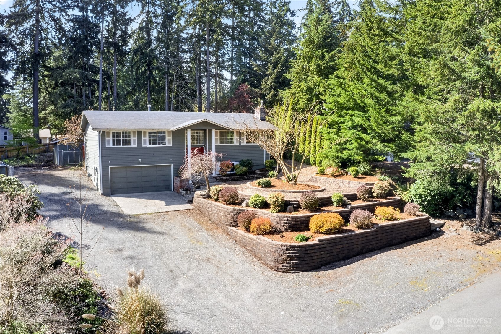 19010 63rd Street East Lake Tapps, WA 98391 - Photo 3 of 32 a view of a house with a yard and furniture