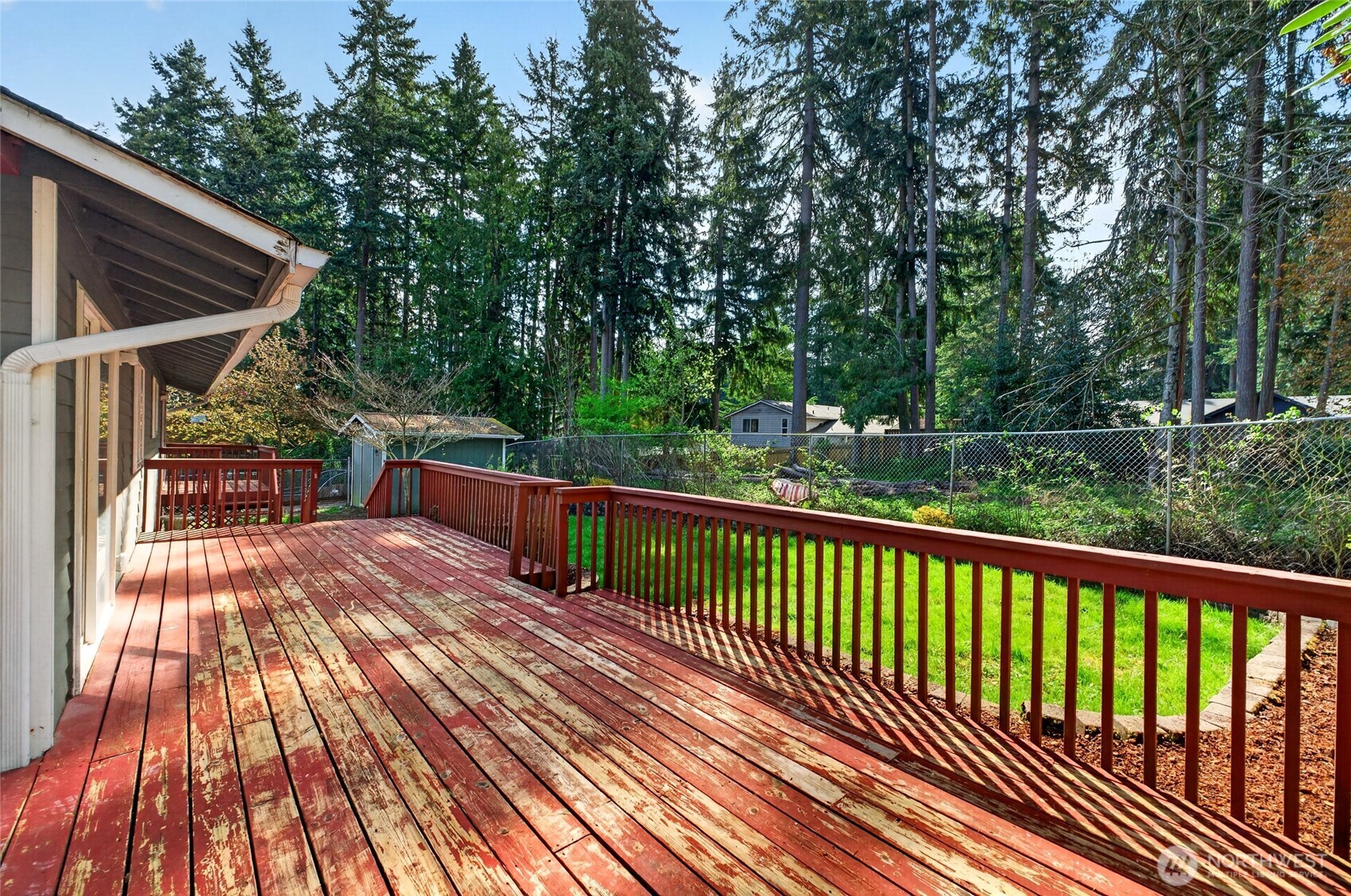19010 63rd Street East Lake Tapps, WA 98391 - Photo 31 of 32 a view of backyard with deck and wooden floor