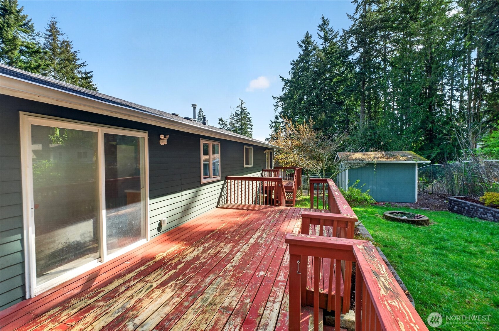 19010 63rd Street East Lake Tapps, WA 98391 - Photo 32 of 32 a view of a house with a swimming pool and a yard