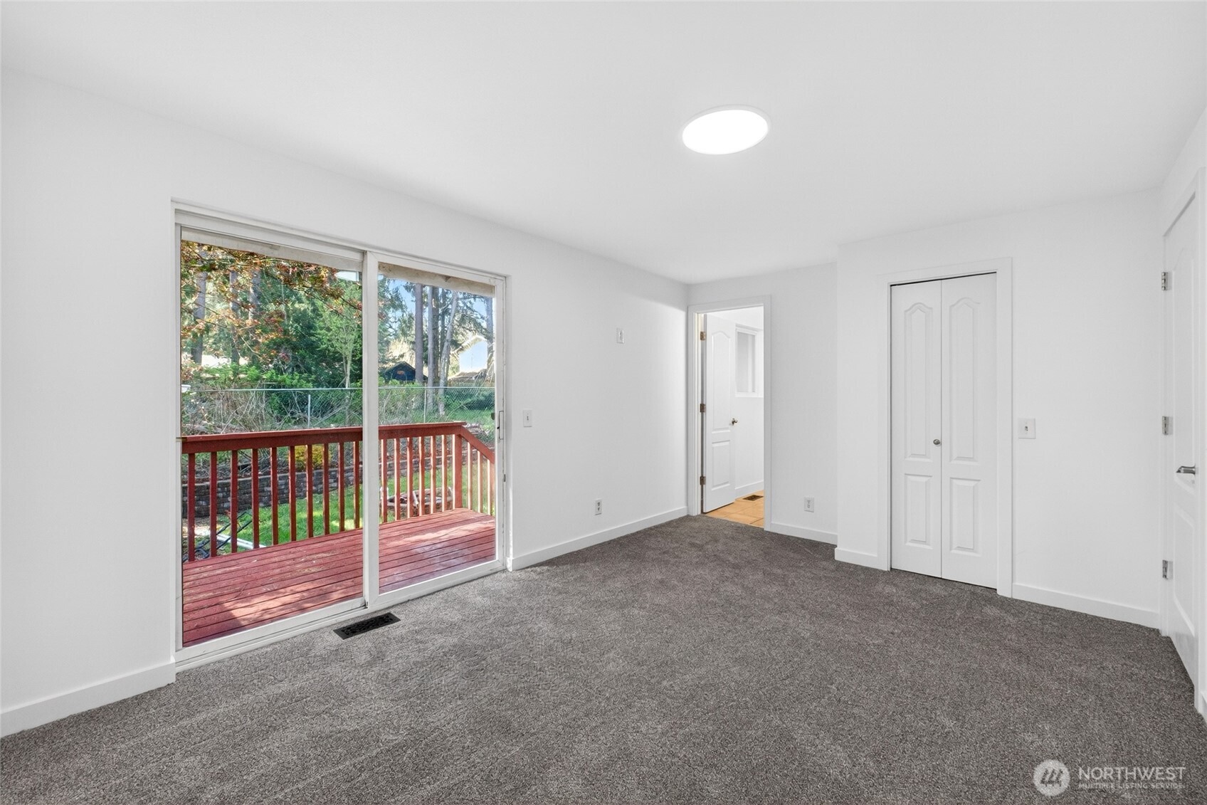 19010 63rd Street East Lake Tapps, WA 98391 - Photo 10 of 32 a view of empty room with floor to ceiling window
