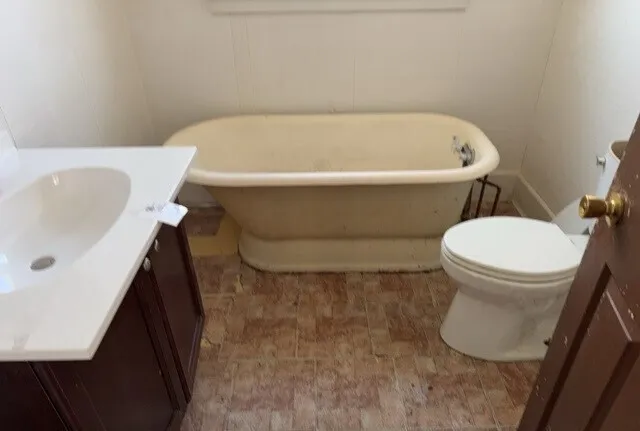 a bathroom with a sink and a toilet