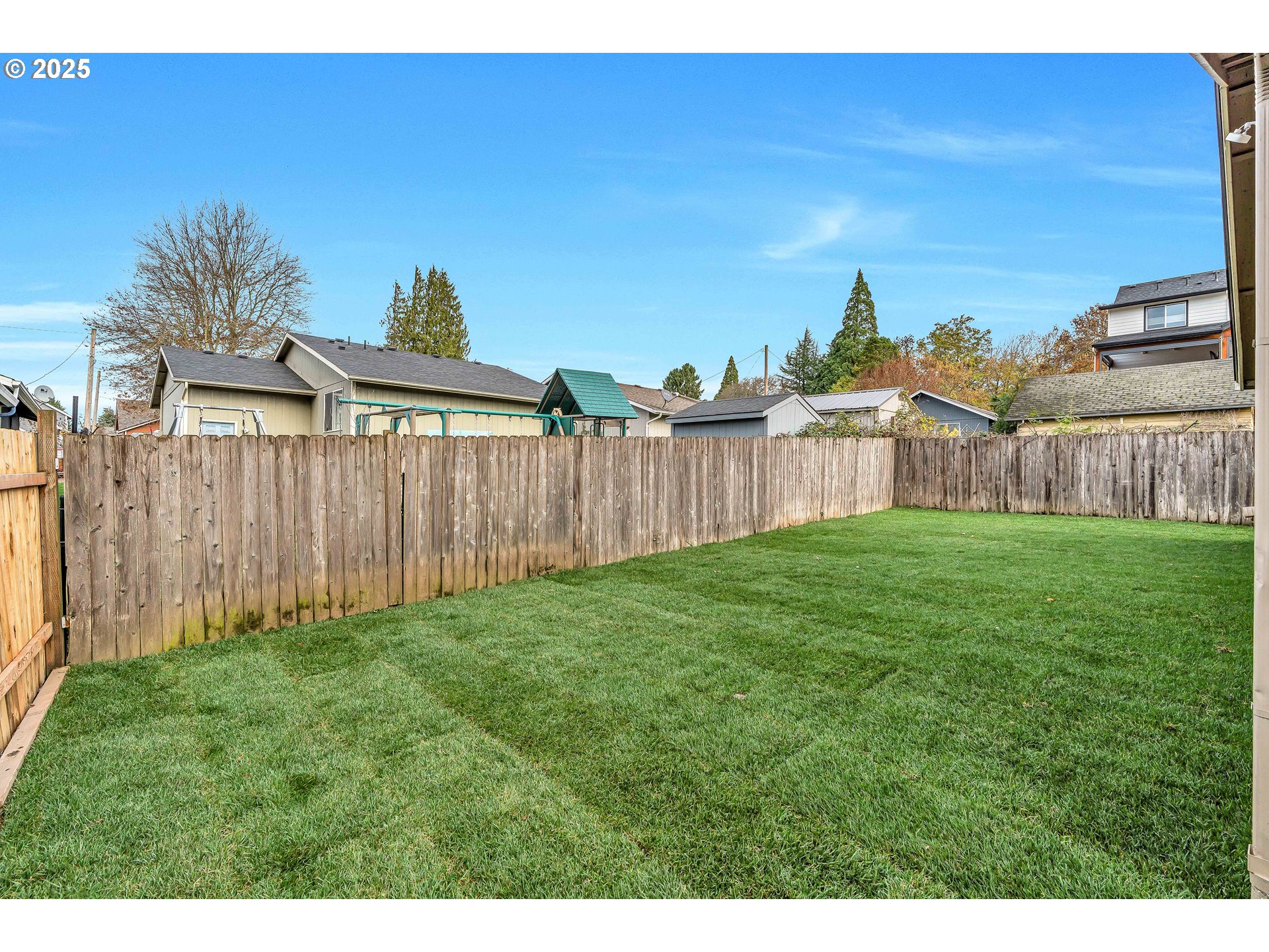 8 Elm Street Ridgefield, WA 98642 - Photo 30 of 33 a view of a backyard with a garden