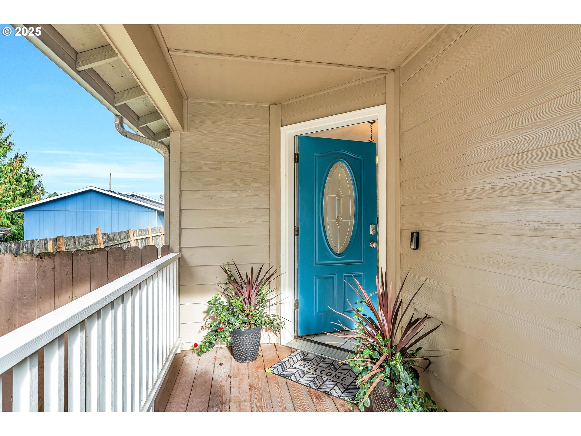 8 Elm Street Ridgefield, WA 98642 - Photo 4 of 33 a view of a wooden door and outdoor space