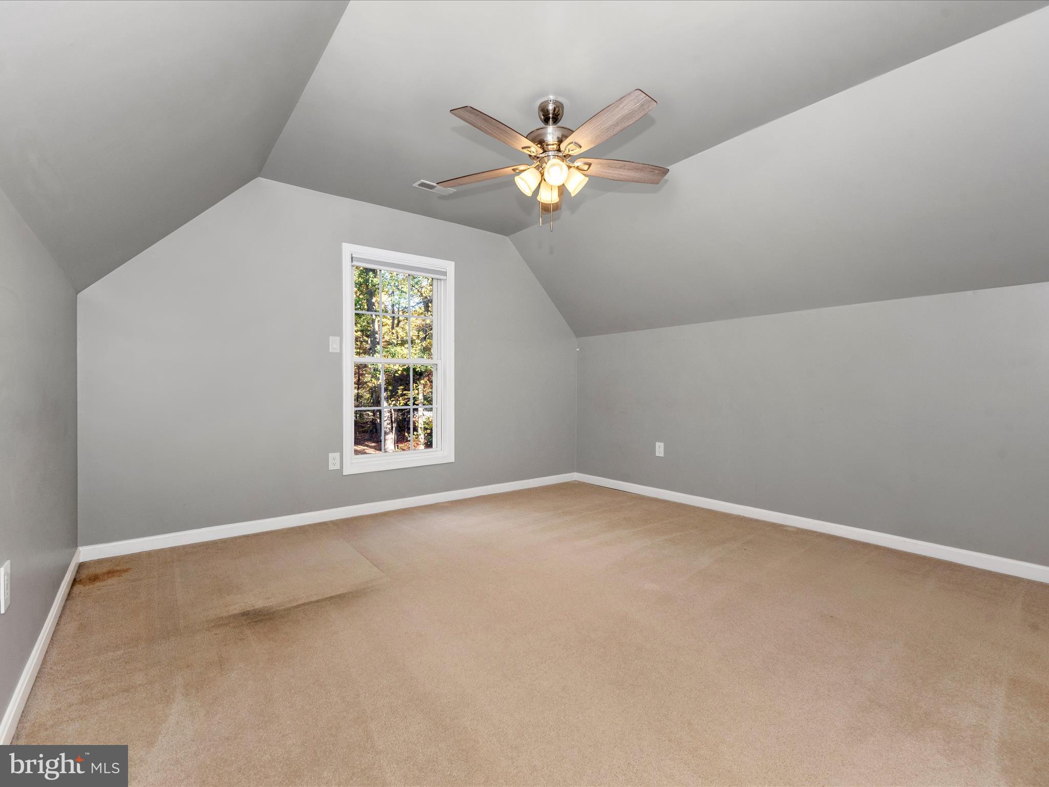10027 Pine Tree Road Woodsboro, MD 21798 - Photo 56 of 81 a view of room with window and ceiling fan
