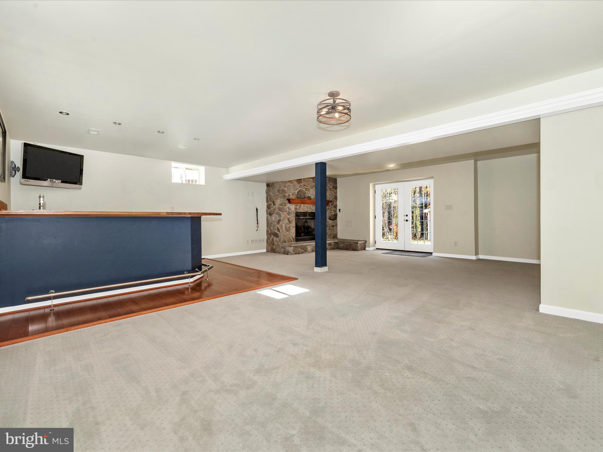 10027 Pine Tree Road Woodsboro, MD 21798 - Photo 63 of 81 a view of an empty room with a fireplace