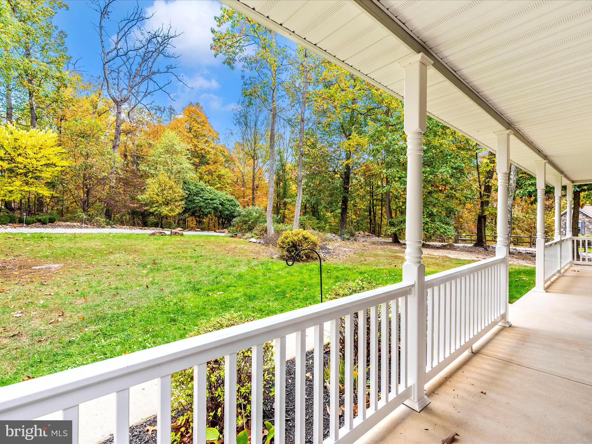 10027 Pine Tree Road Woodsboro, MD 21798 - Photo 68 of 81 a view of a porch with a yard