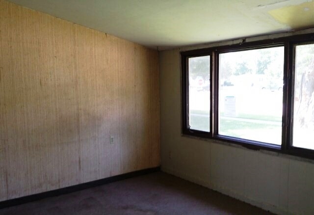 7407 Mildred Road Machesney Park, IL 61115 - Photo 3 of 10 a view of a small space with a window
