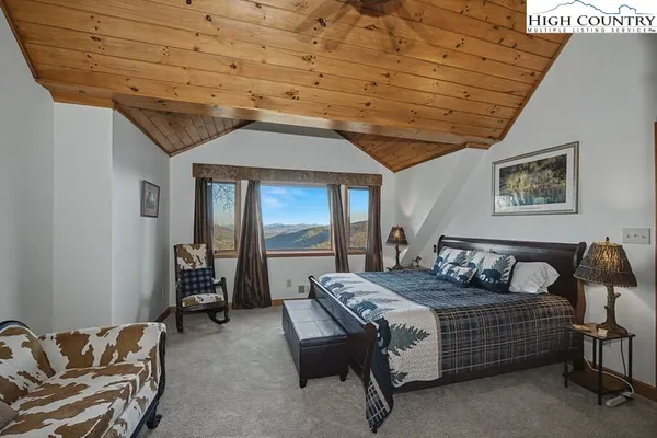 a bedroom with furniture and a couch