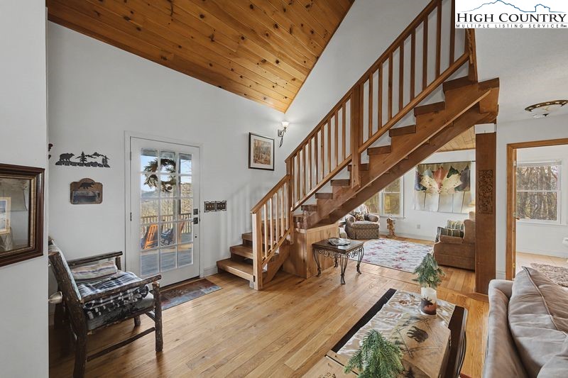 137 Granny's Ridge Road Ferguson, NC 28624 - Photo 20 of 27 a view of entryway livingroom and hall with wooden floor