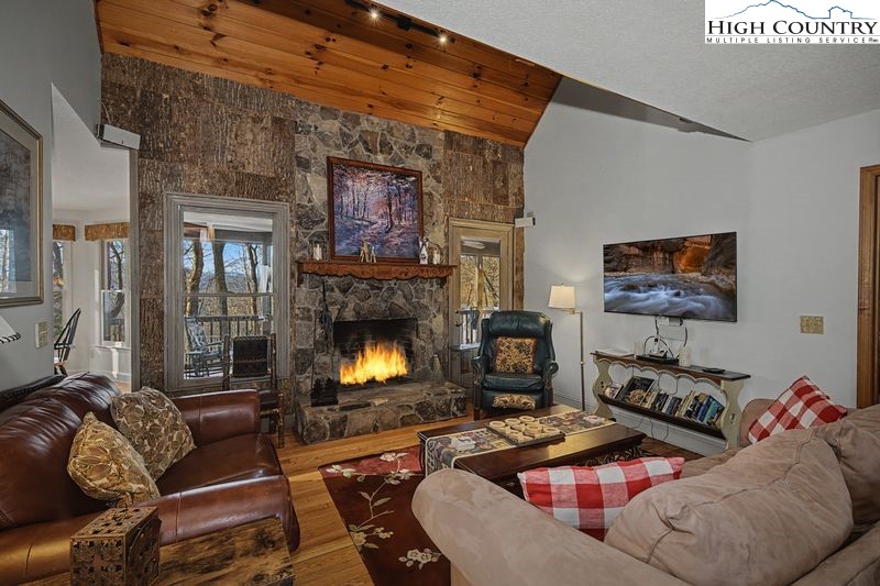 137 Granny's Ridge Road Ferguson, NC 28624 - Photo 5 of 27 a living room with furniture and a fireplace