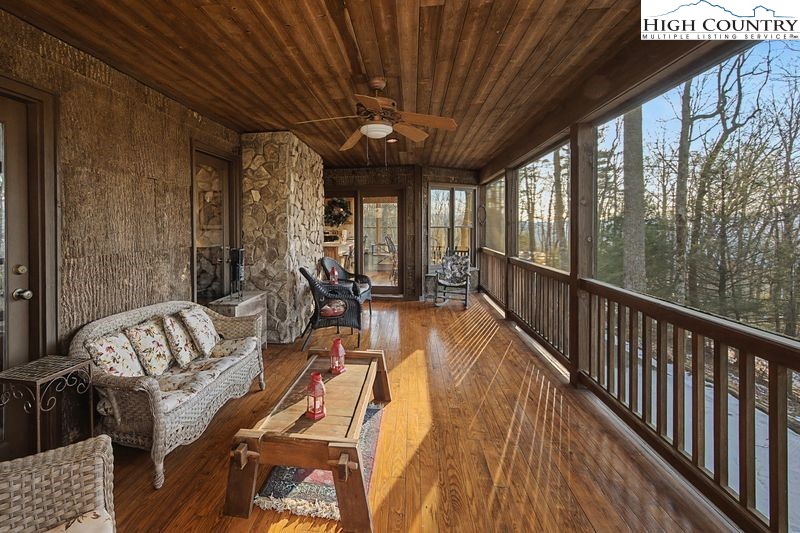 137 Granny's Ridge Road Ferguson, NC 28624 - Photo 8 of 27 a view of balcony with couch