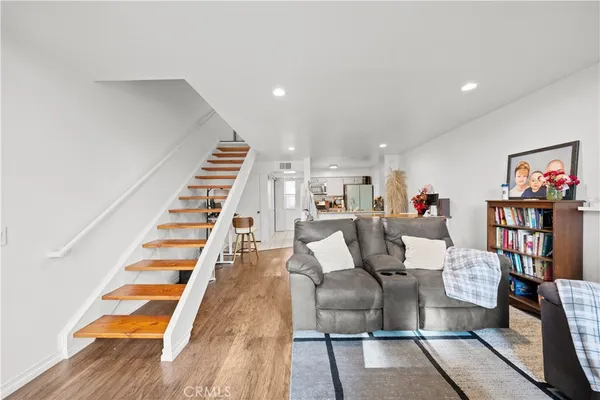 a view of livingroom with furniture and wooden floor