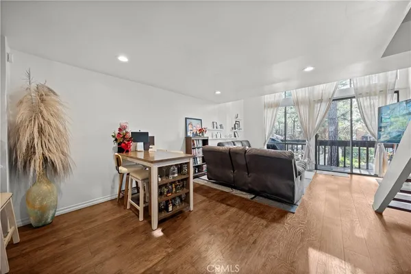 a kitchen with a table and chairs in it