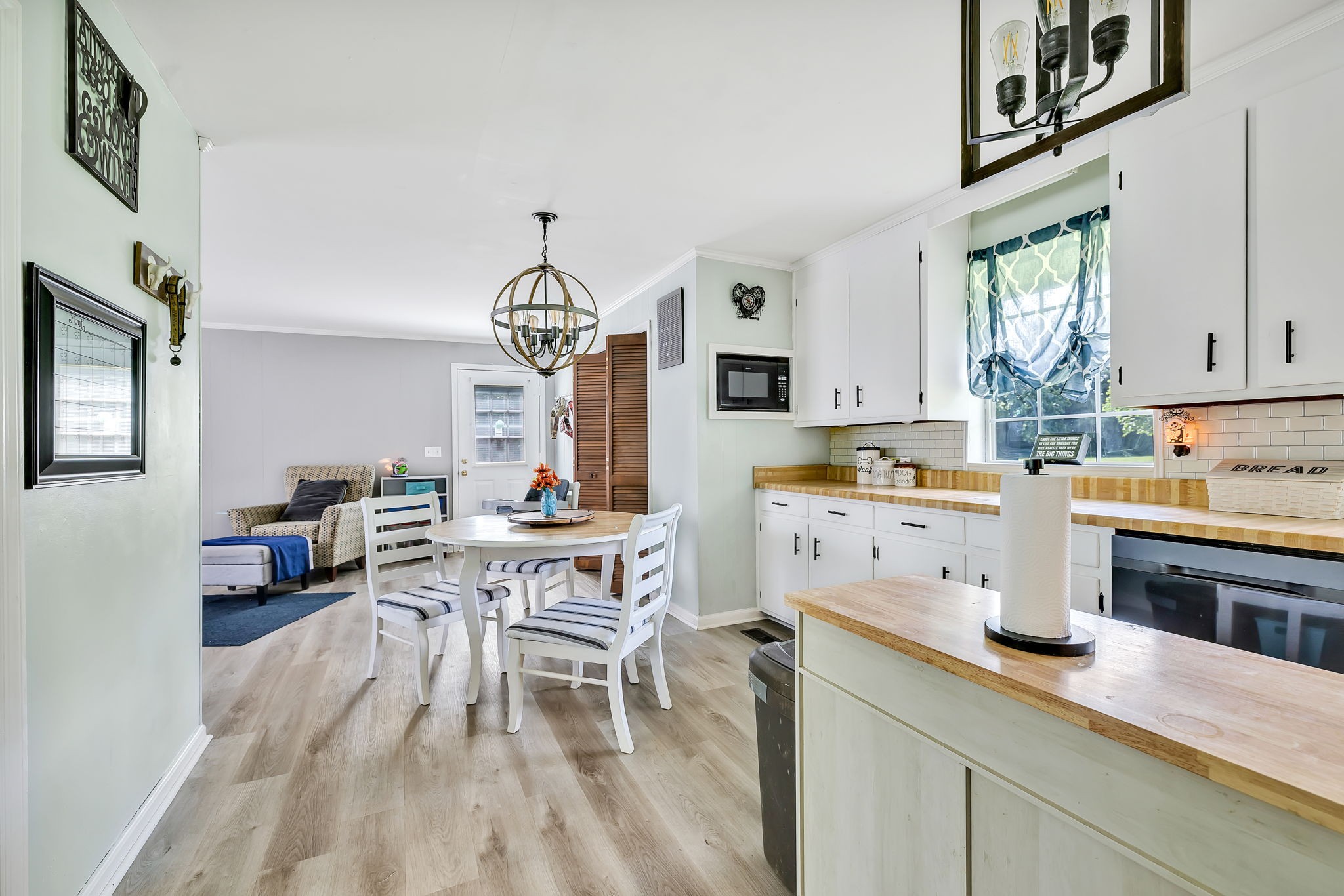 436 Youree Road Murfreesboro, TN 37127 - Photo 14 of 32 a kitchen with a sink stove and cabinets