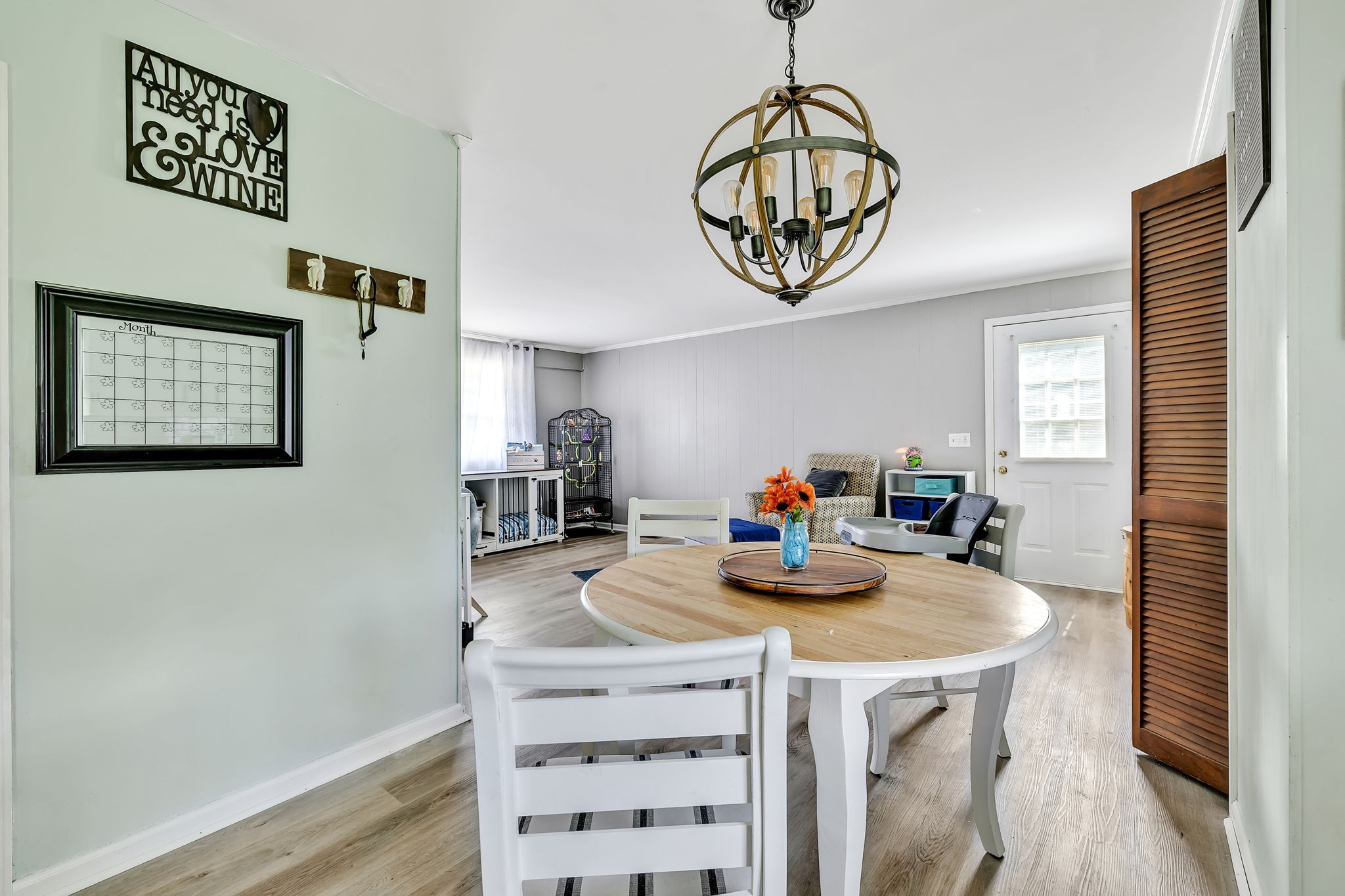 436 Youree Road Murfreesboro, TN 37127 - Photo 16 of 32 a kitchen with a table chairs and a refrigerator