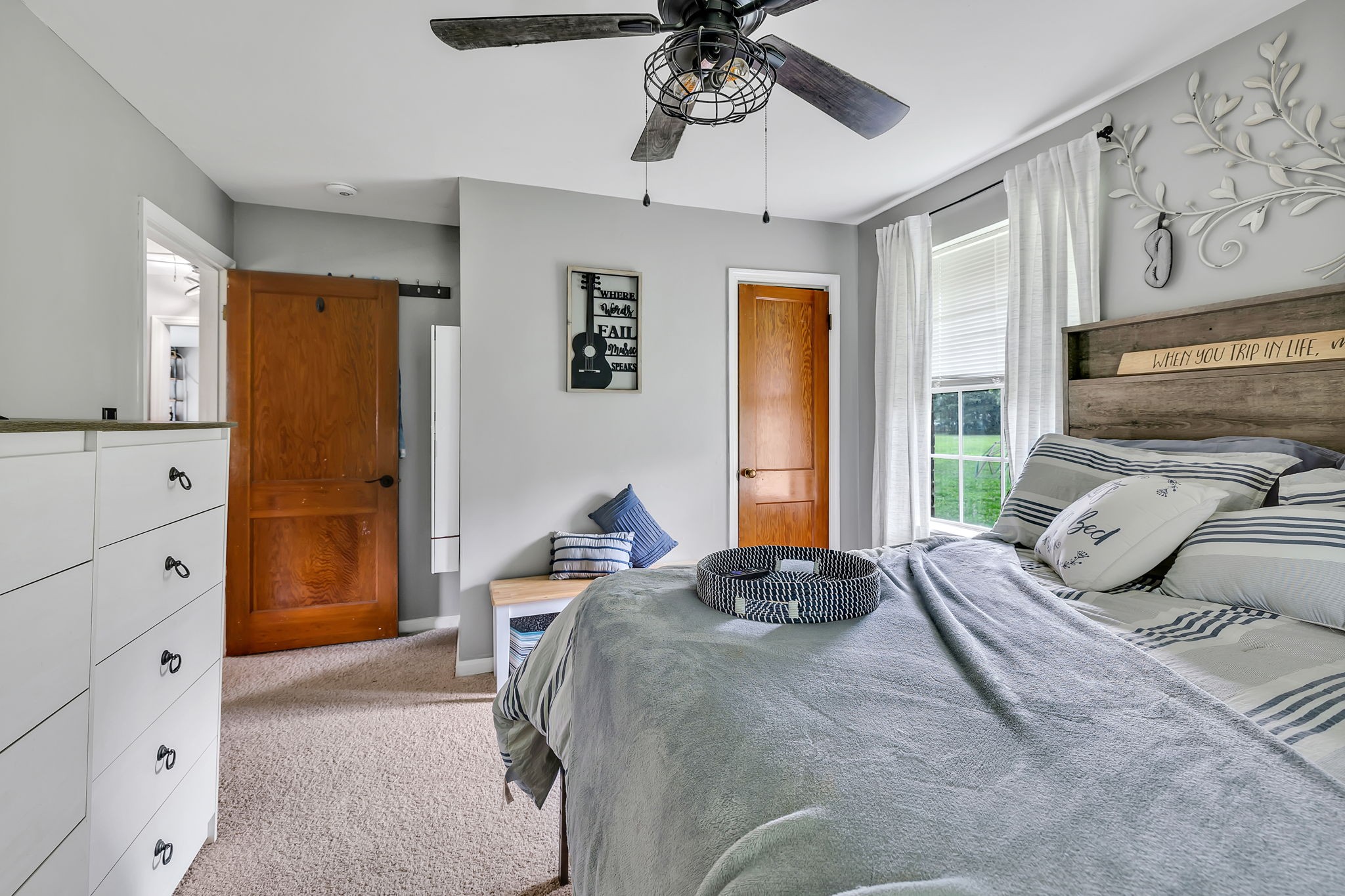 436 Youree Road Murfreesboro, TN 37127 - Photo 22 of 32 a bedroom with a bed and a chandelier