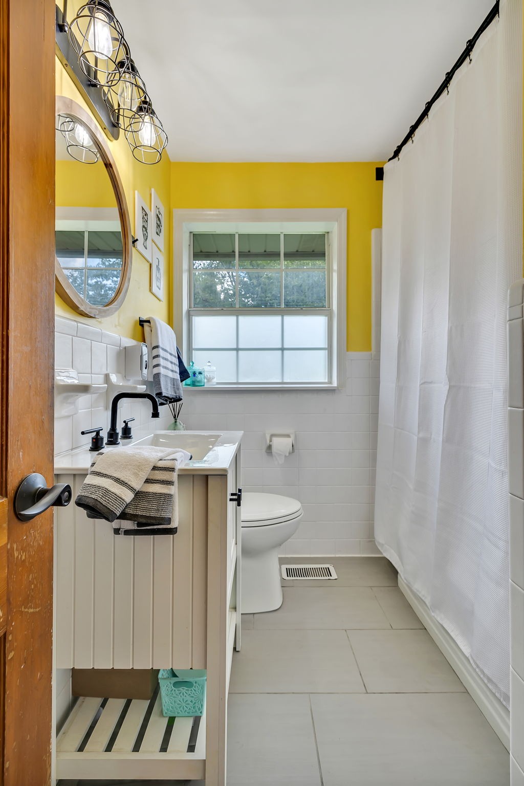 436 Youree Road Murfreesboro, TN 37127 - Photo 25 of 32 a bathroom with a sink a toilet and a mirror
