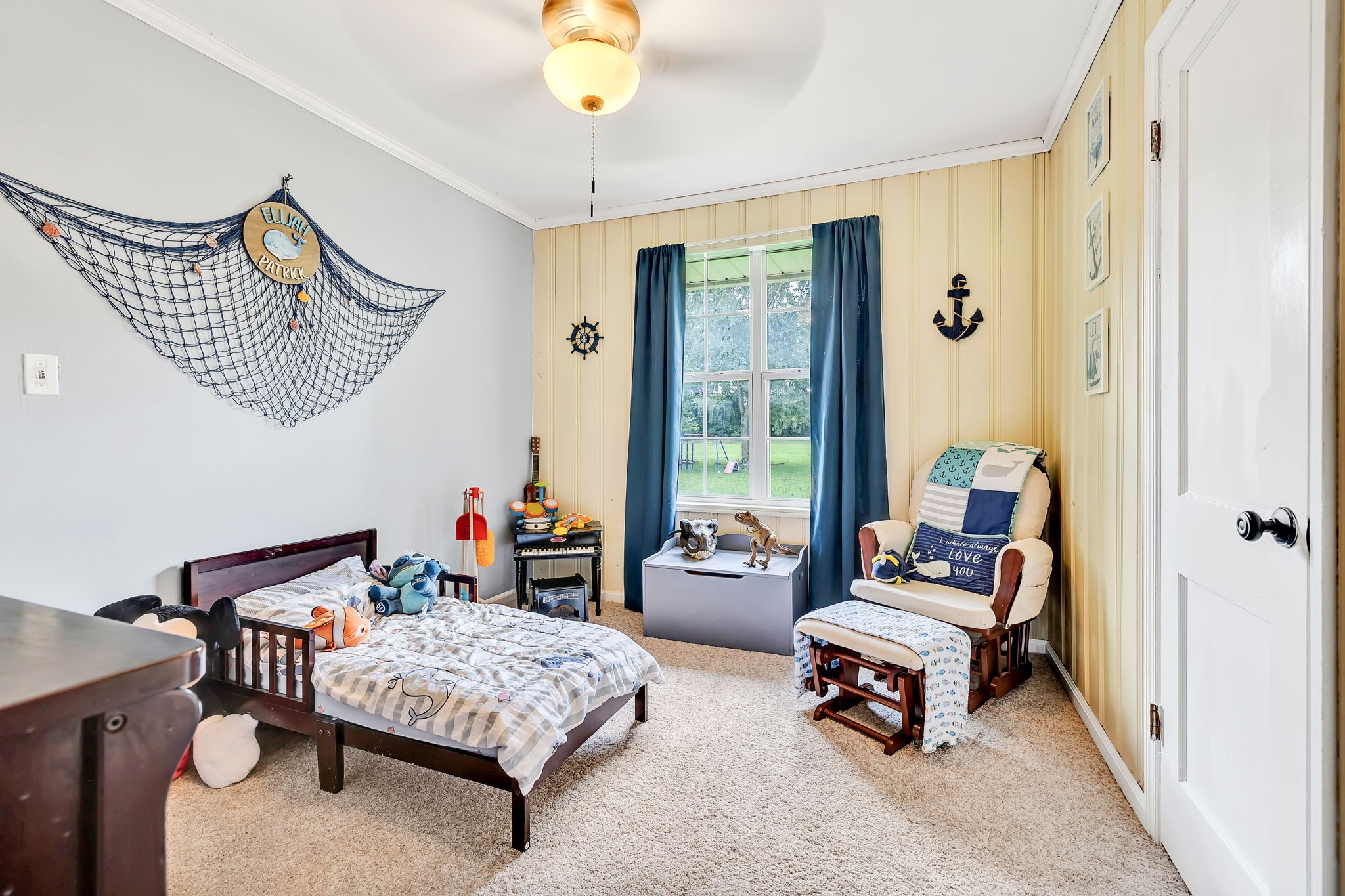 436 Youree Road Murfreesboro, TN 37127 - Photo 26 of 32 a living room with furniture and a large window