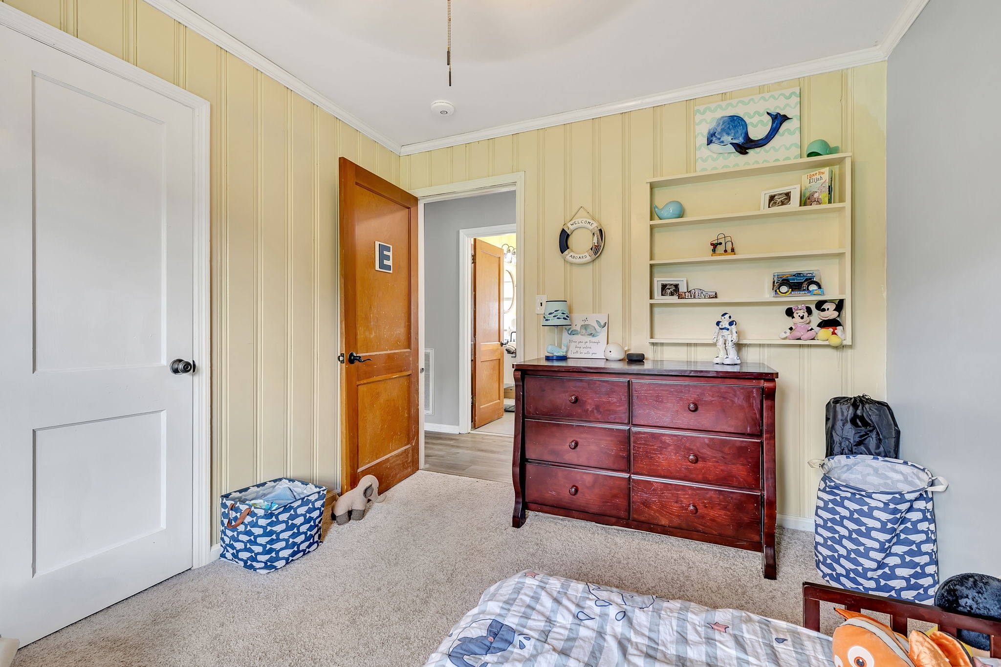 436 Youree Road Murfreesboro, TN 37127 - Photo 27 of 32 a bedroom with a bed and a dresser in it