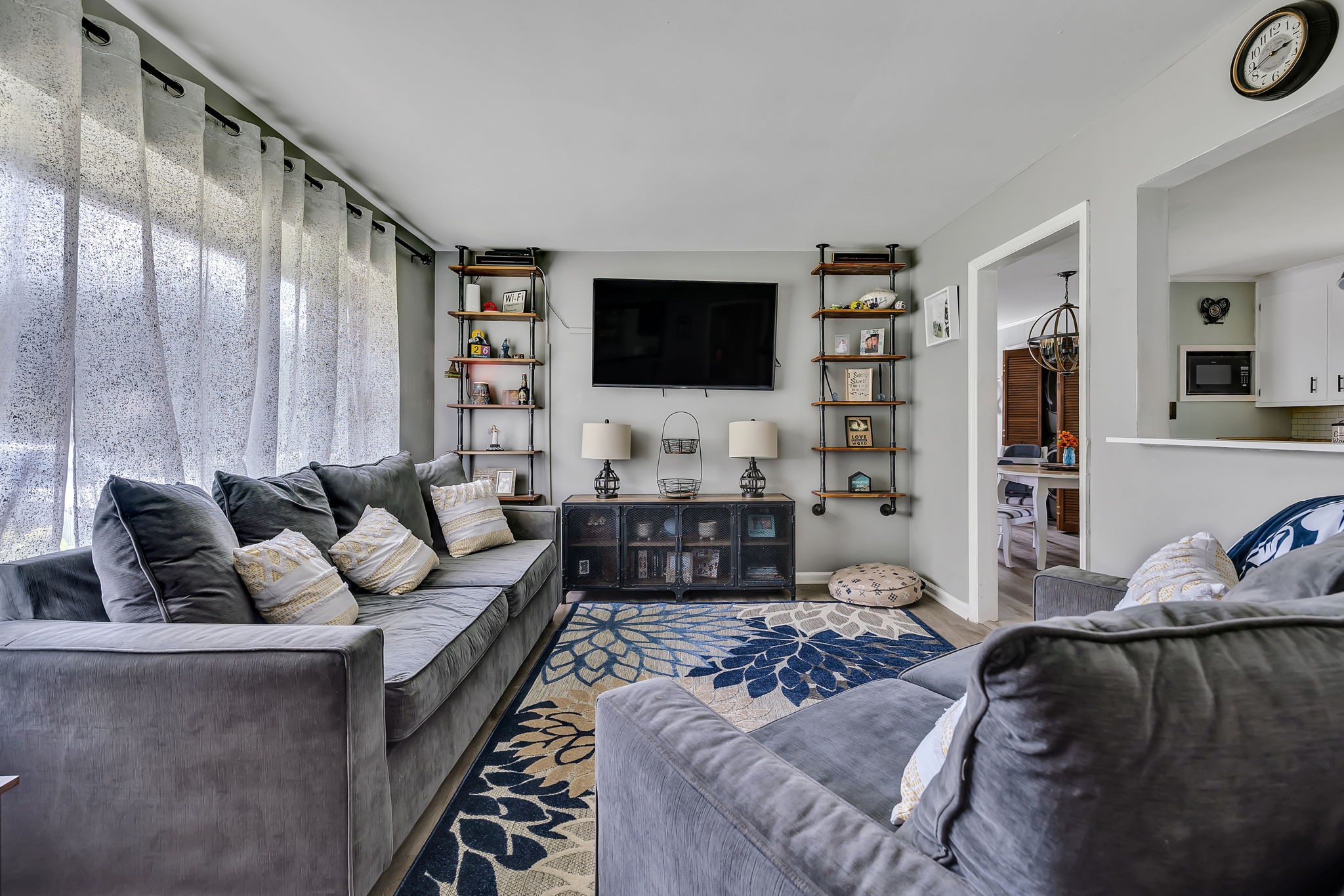 436 Youree Road Murfreesboro, TN 37127 - Photo 9 of 32 a living room with furniture and a flat screen tv