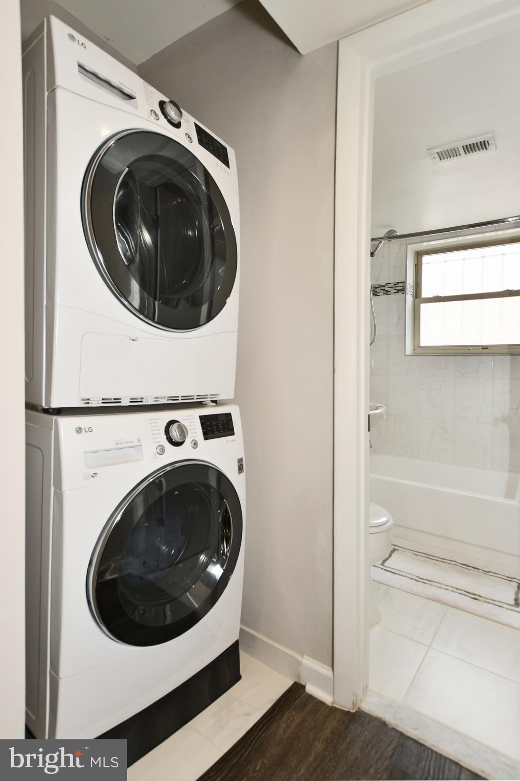 2900 Pomeroy Road Southeast, Unit 104 Washington, DC 20020 - Photo 13 of 19 a utility room with dryer and washer
