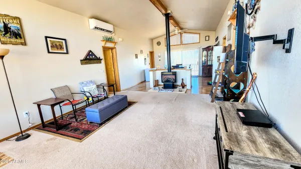 a bed room with furniture and a window