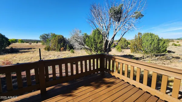 a view of a wooden roof deck