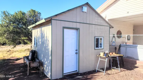 a view of backyard of house