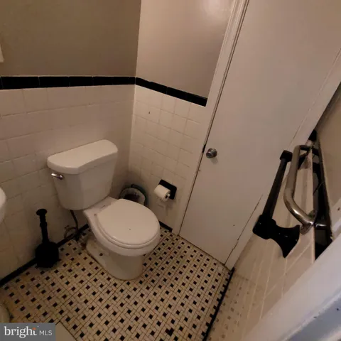 a view of livingroom with furniture and a window