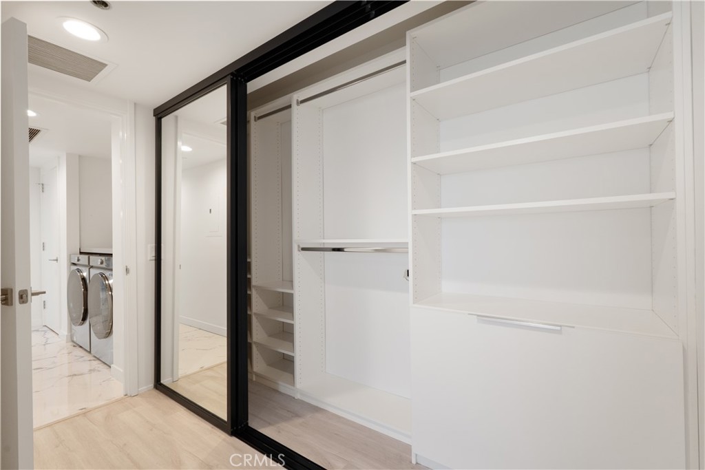 222 Monterey Road, Unit 901 Glendale, CA 91206 - Photo 49 of 68 a view of walk in closet with empty racks
