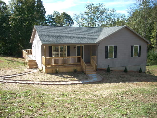1071 Chandler Road Goodview, VA 24095 - Photo 1 of 17 a house view with a outdoor space