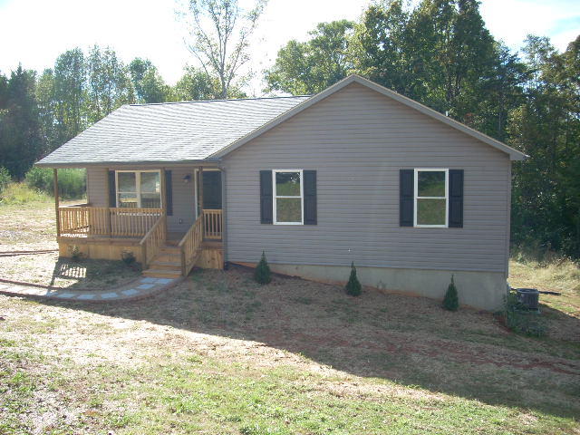 1071 Chandler Road Goodview, VA 24095 - Photo 3 of 17 a backyard of a house
