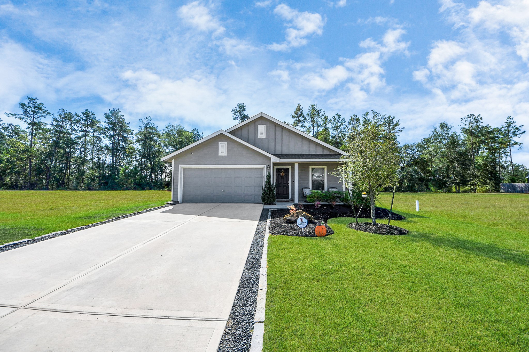 22828 Great Egret Drive Splendora, TX 77372 - Photo 25 of 39 a front view of house with garden