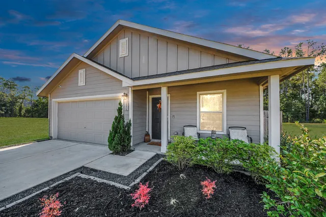 a front view of house with a yard