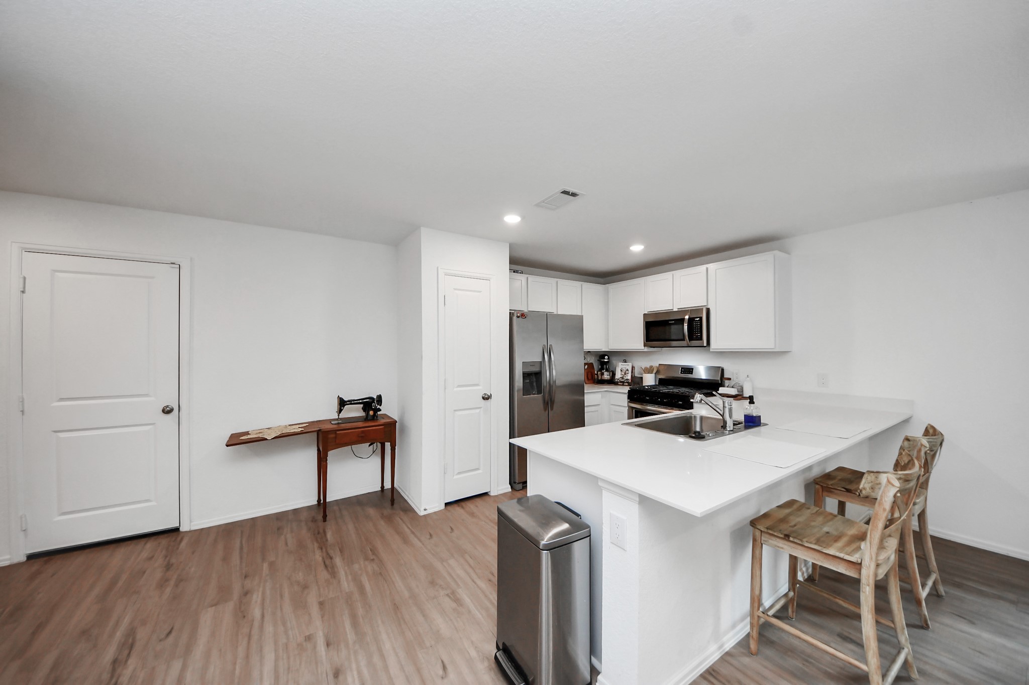 22828 Great Egret Drive Splendora, TX 77372 - Photo 37 of 39 a view of a workspace with furniture and wooden floor