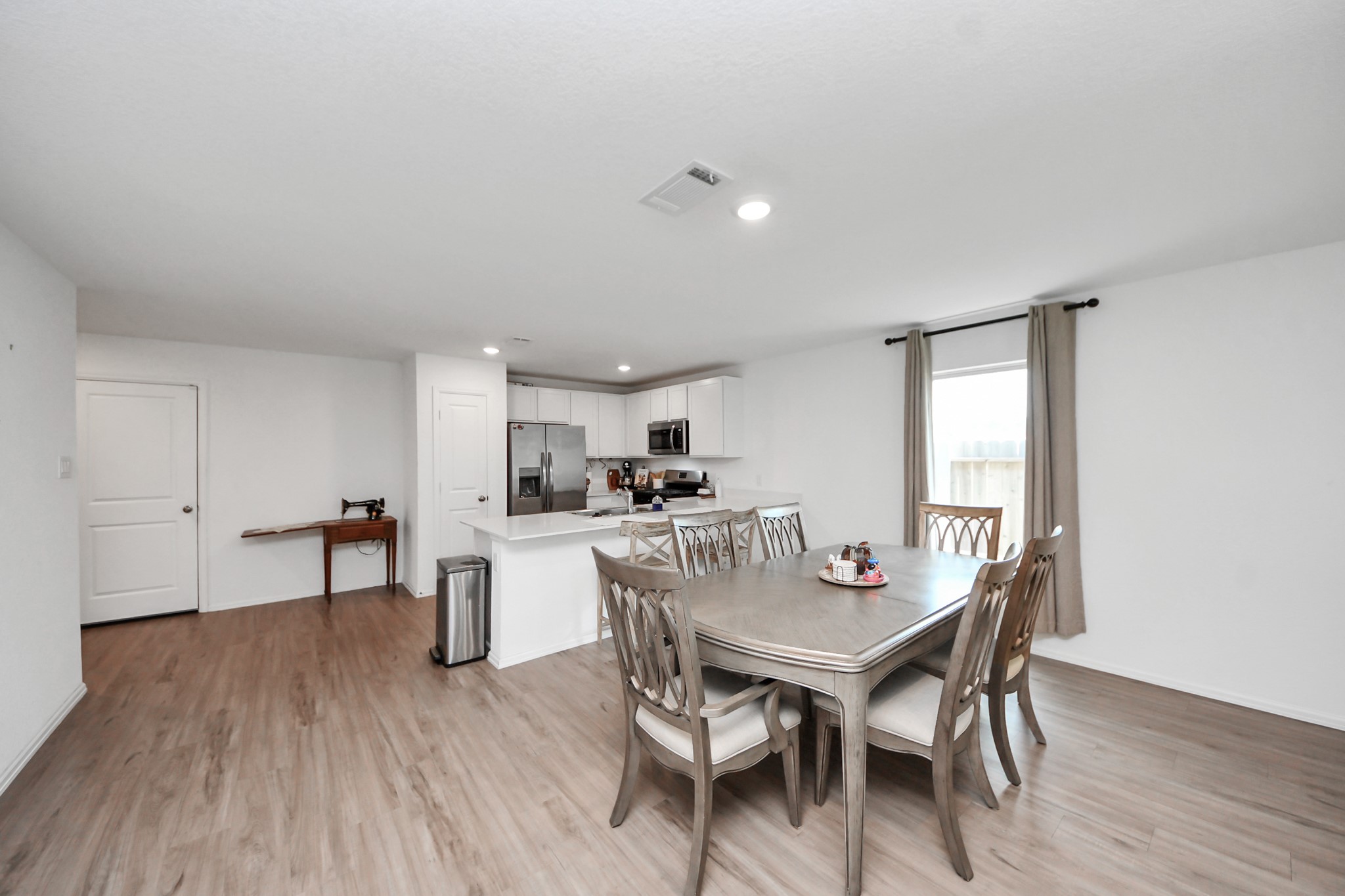 22828 Great Egret Drive Splendora, TX 77372 - Photo 38 of 39 a dining room with furniture and wooden floor