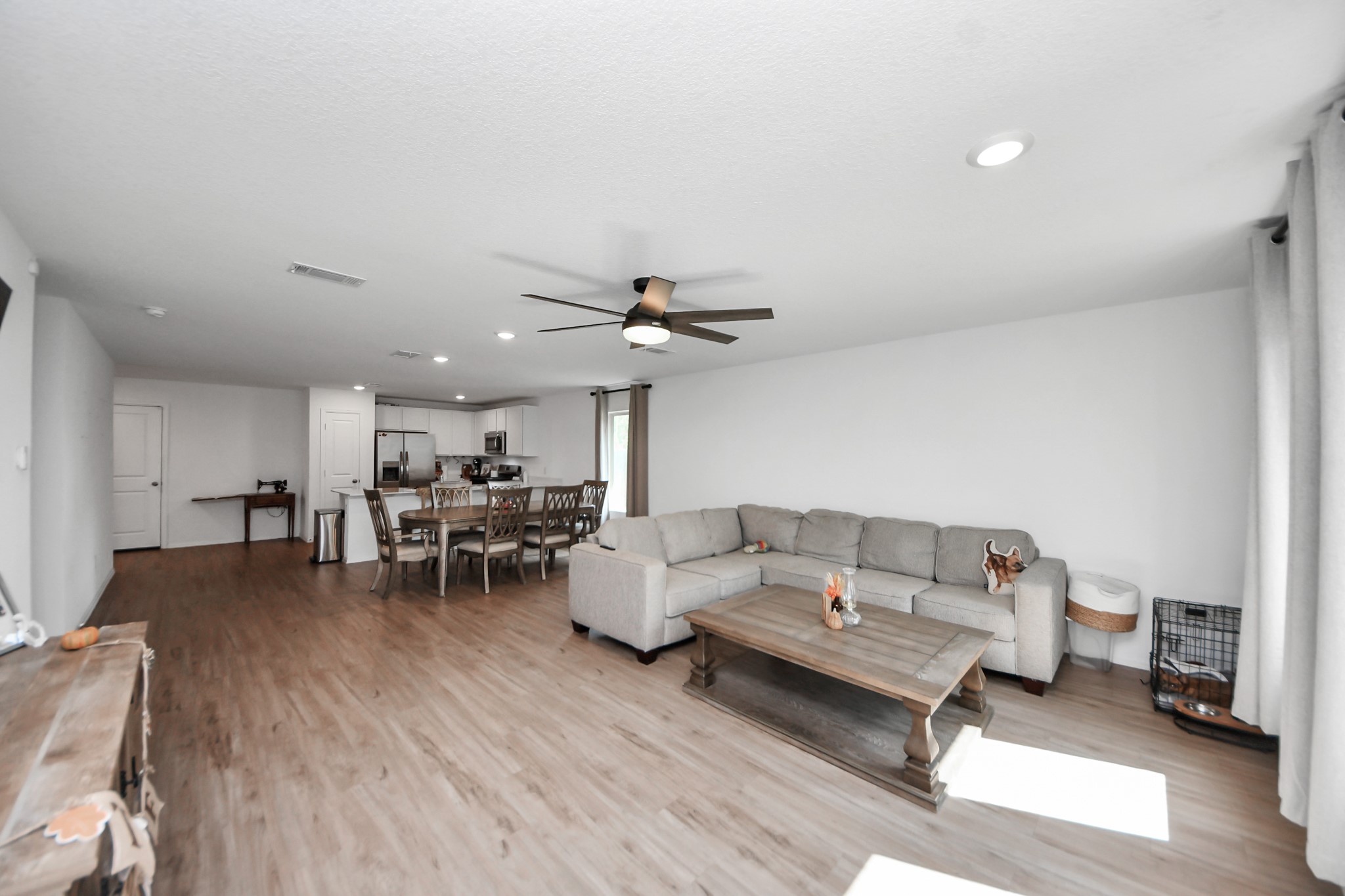 22828 Great Egret Drive Splendora, TX 77372 - Photo 39 of 39 a living room with furniture and a wooden floor