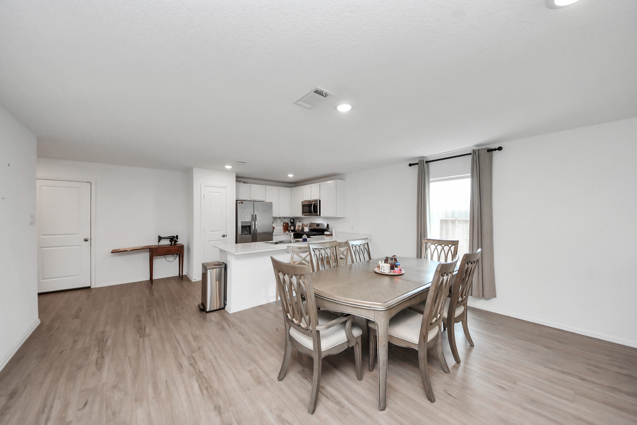 22828 Great Egret Drive Splendora, TX 77372 - Photo 6 of 39 a dining room with furniture and wooden floor