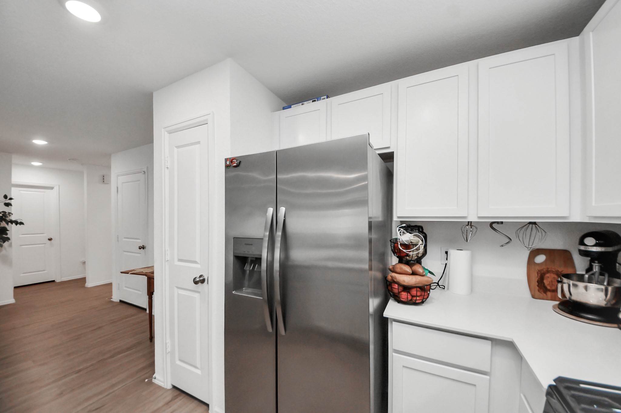 22828 Great Egret Drive Splendora, TX 77372 - Photo 8 of 39 a kitchen with stainless steel appliances refrigerator and microwave