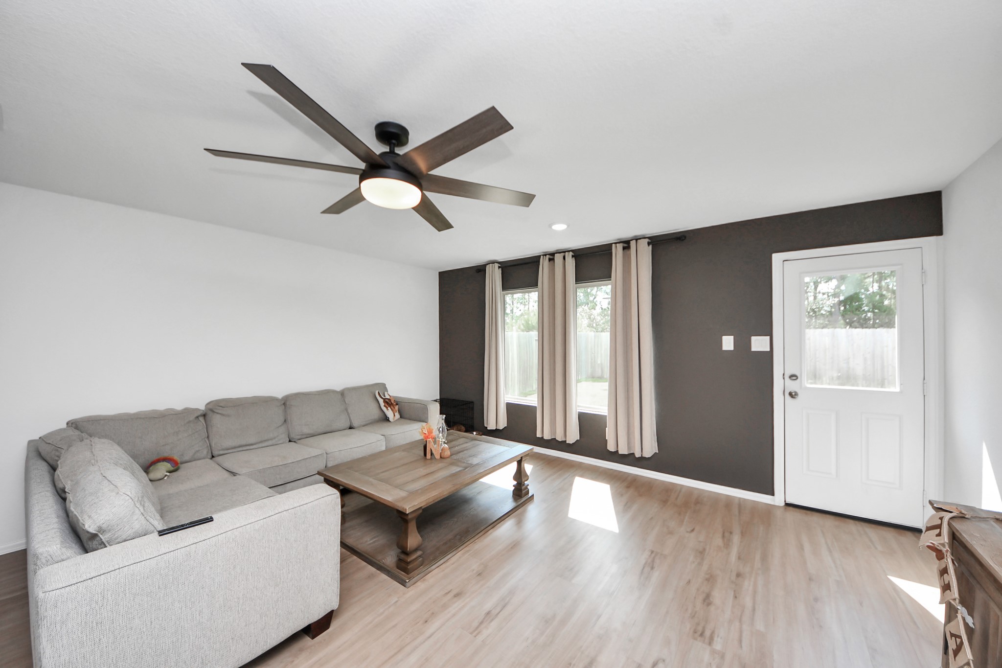 22828 Great Egret Drive Splendora, TX 77372 - Photo 10 of 39 a living room with furniture and a window