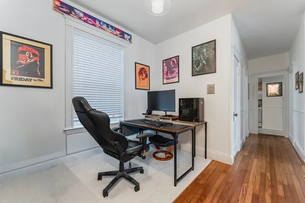 a workspace with a bookshelf