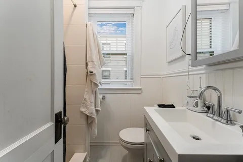 a bathroom with a sink and a toilet